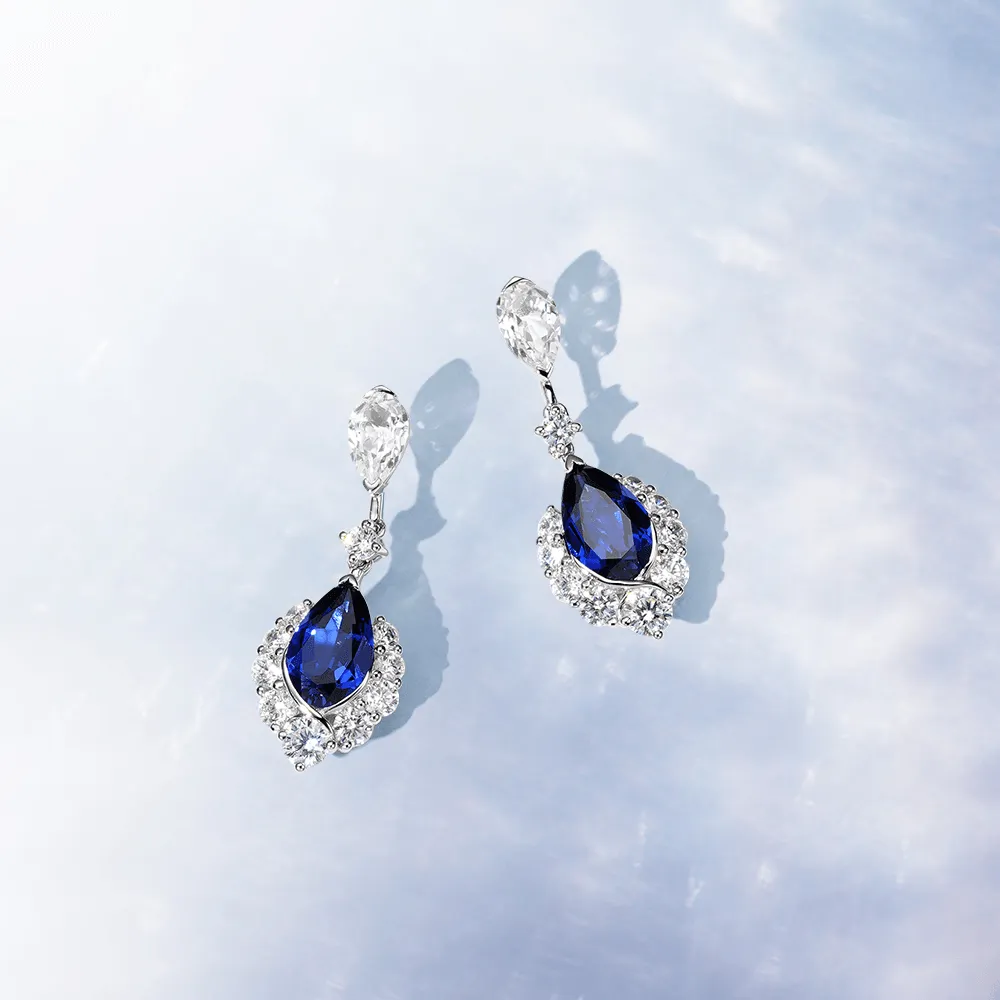 "ENDLESS BLUE" 7.26 Ctw. Pear Shaped Sapphire Earrings